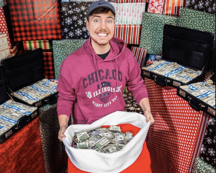 Image of MrBeast holding sack of money