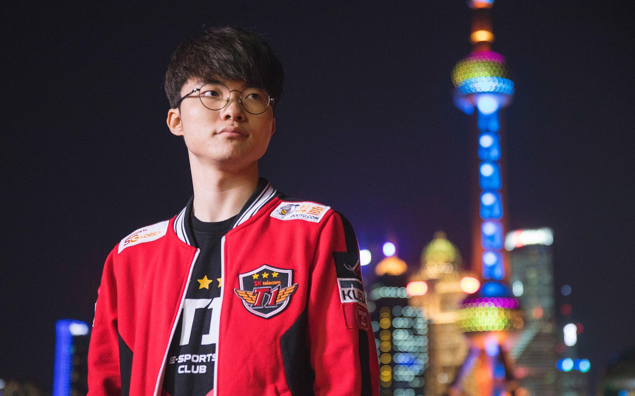 Faker wearing SKT jacket and jersey