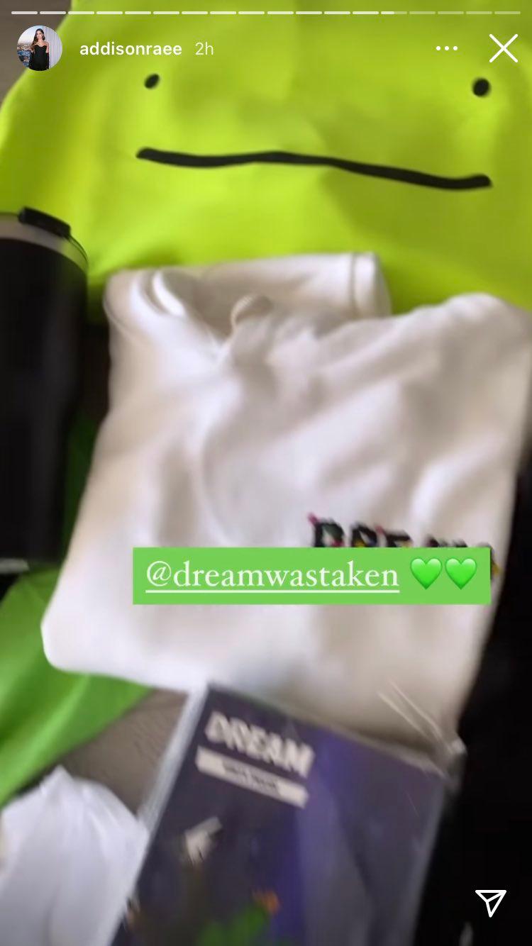 Addison shows off Dream's merch.