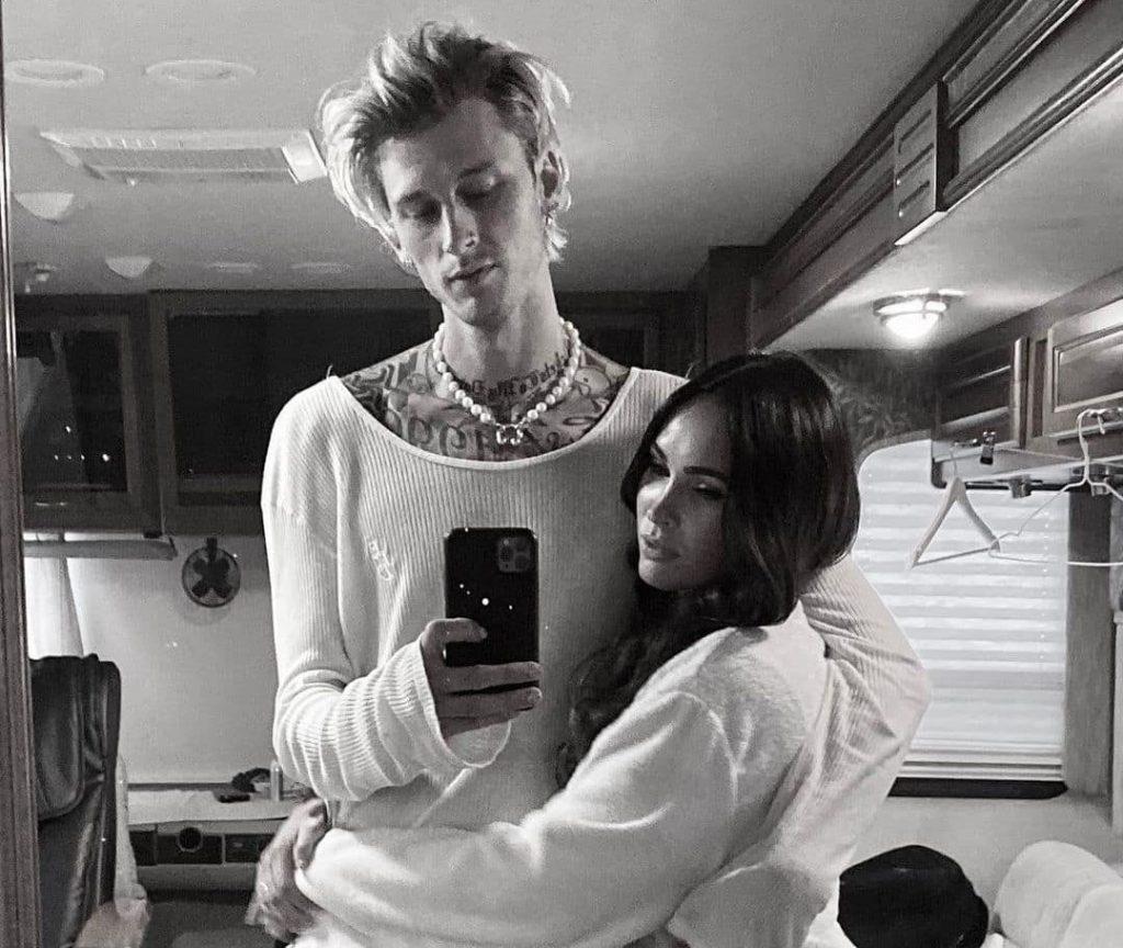 Machine Gun Kelly hugs girlfriend Megan Fox in black and white selfie