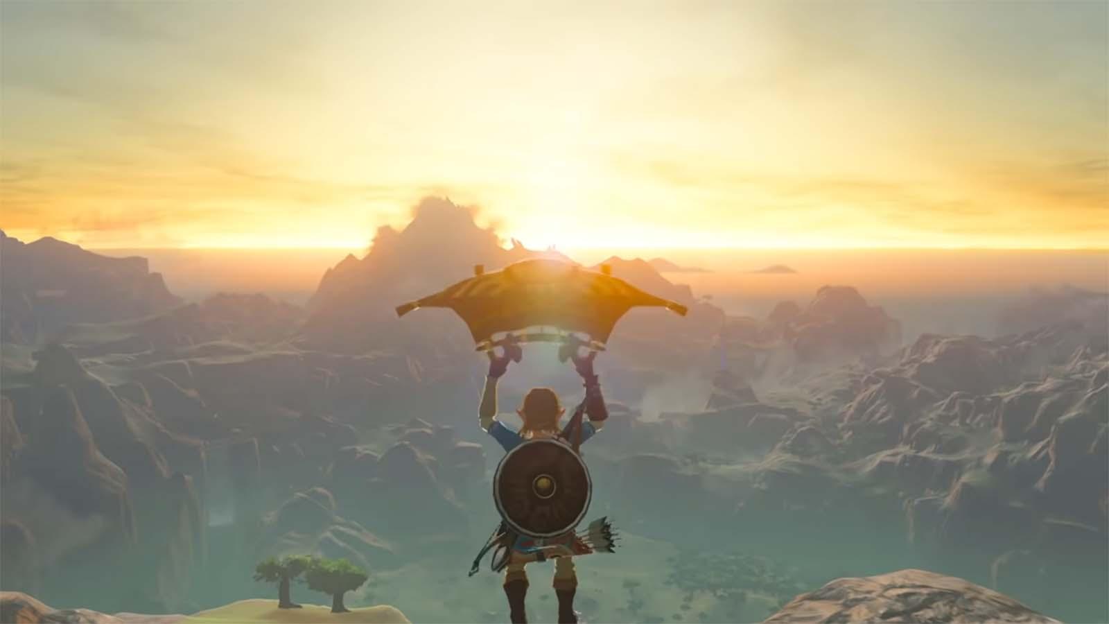 Zelda Breath of the Wild screenshot showing Link gliding toward a sunset