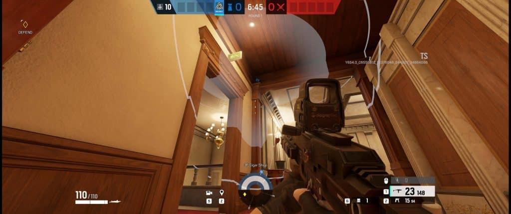 Rainbow Six Siege screenshot showing the Razorbloom Shell gadget above a doorway