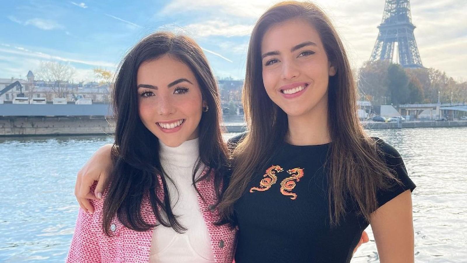 Alexandra and Andrea Botez in front of eiffel tower