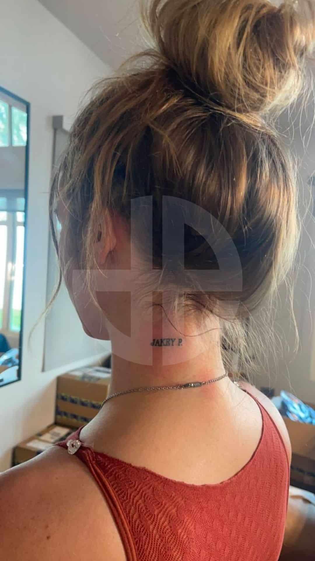 jake paul tattoo on onlyfans model's neck