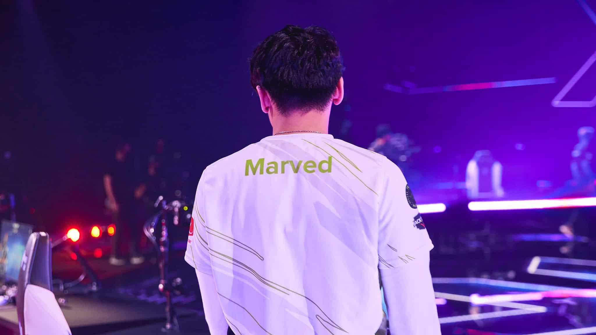 Marved's back as he walk on stage.