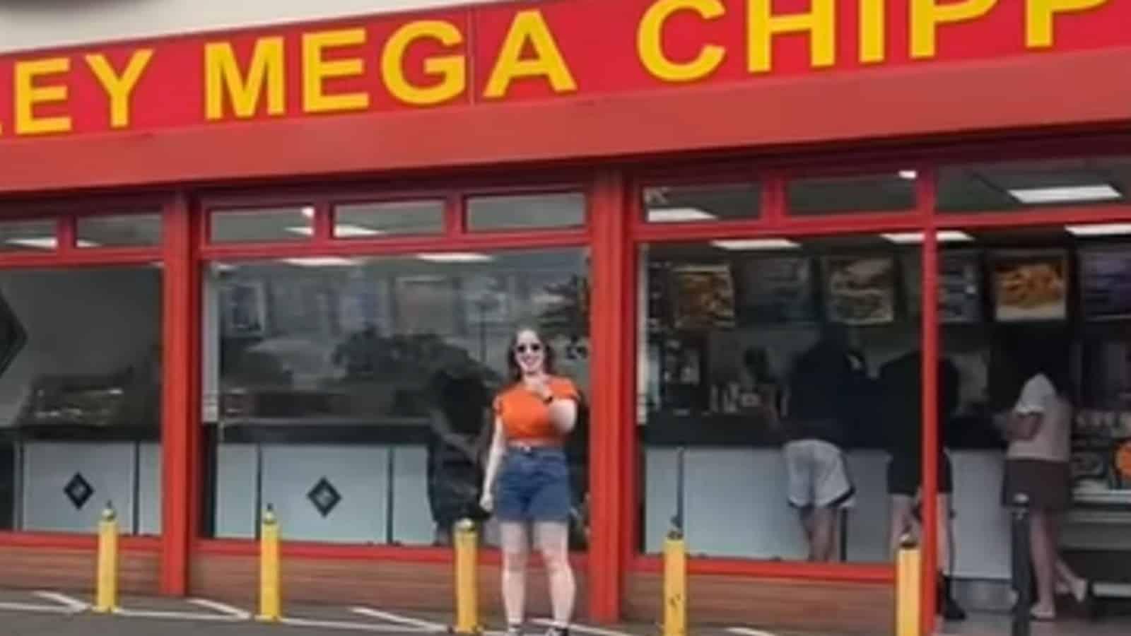 TikToker standing outside Binley Mega Chippy