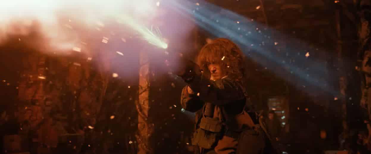 Nancy firing a gun in stranger things