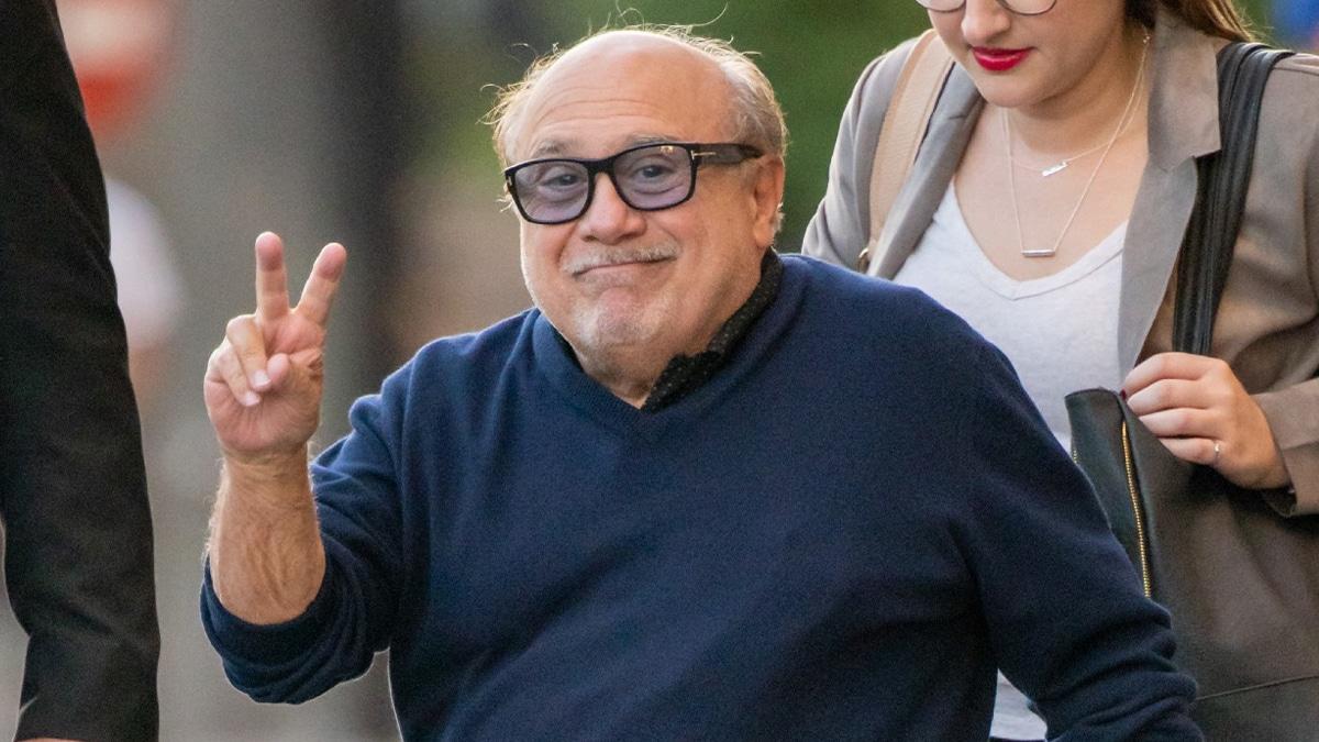 danny devito giving peace sign