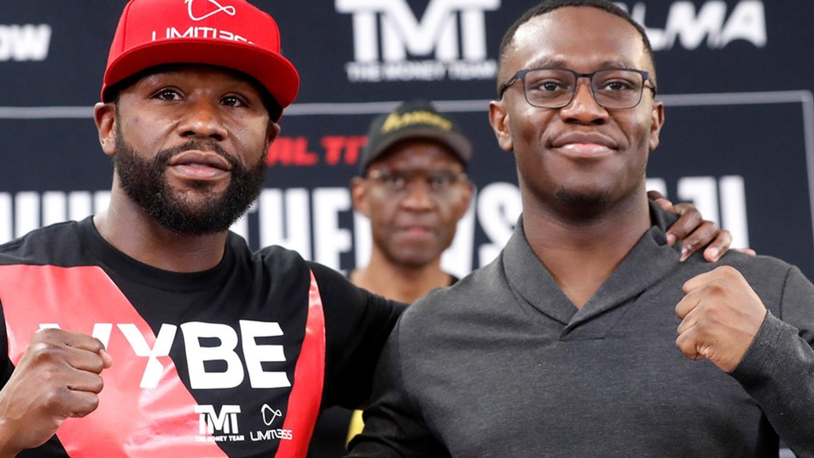 Floyd Mayweather Jr. and Deji Olatunki at their faceoff.