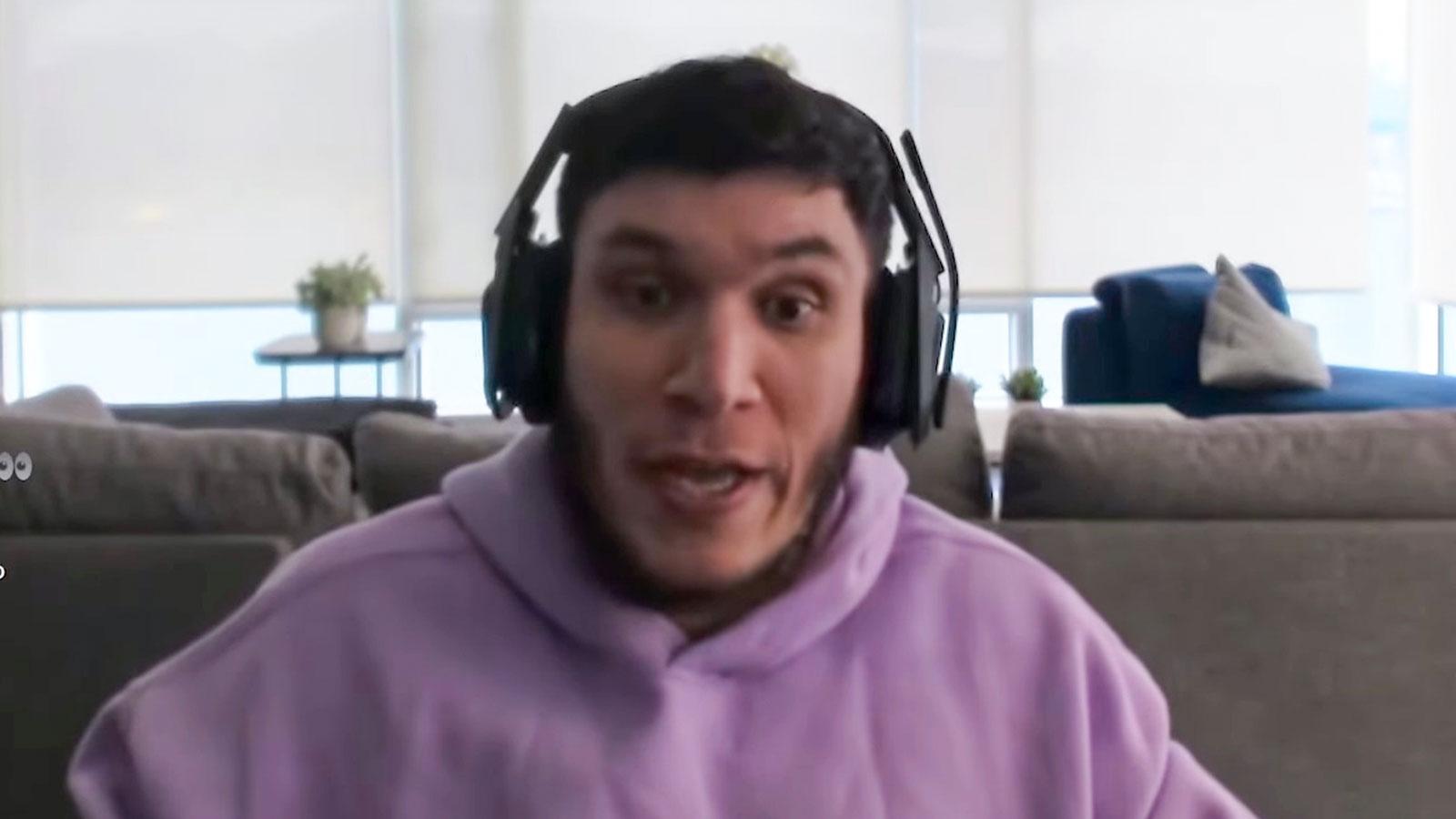 Streaming Trainwrecks wearing purple hoodie