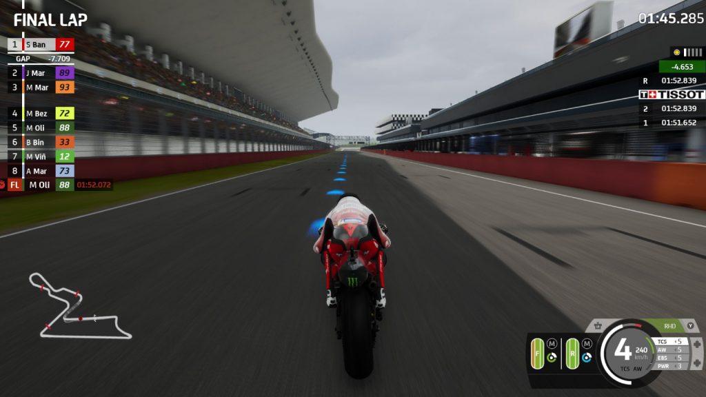 a rider riding a bike in MotoGP 2023