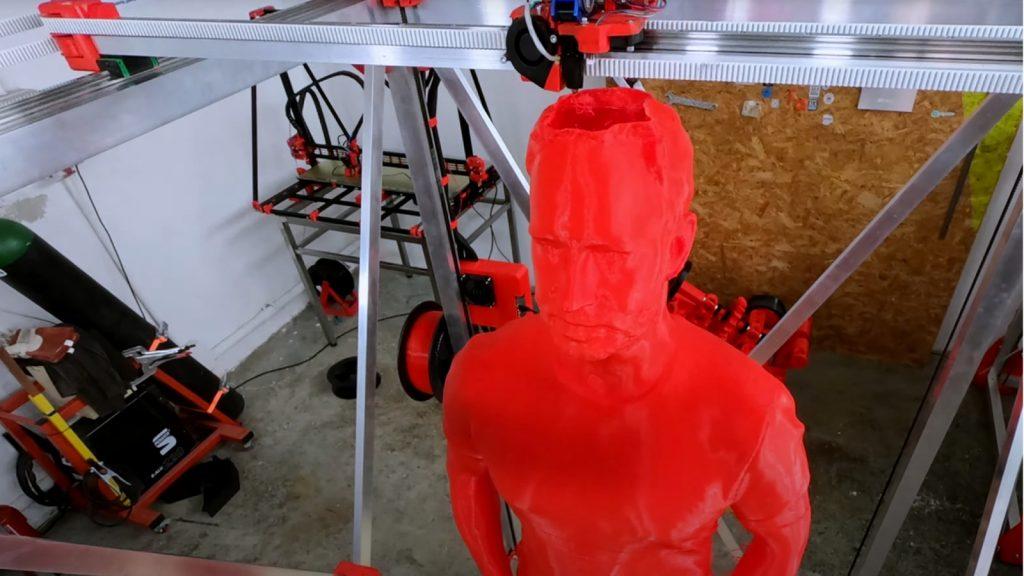 3D printed clone with scalp being printed in a workshop