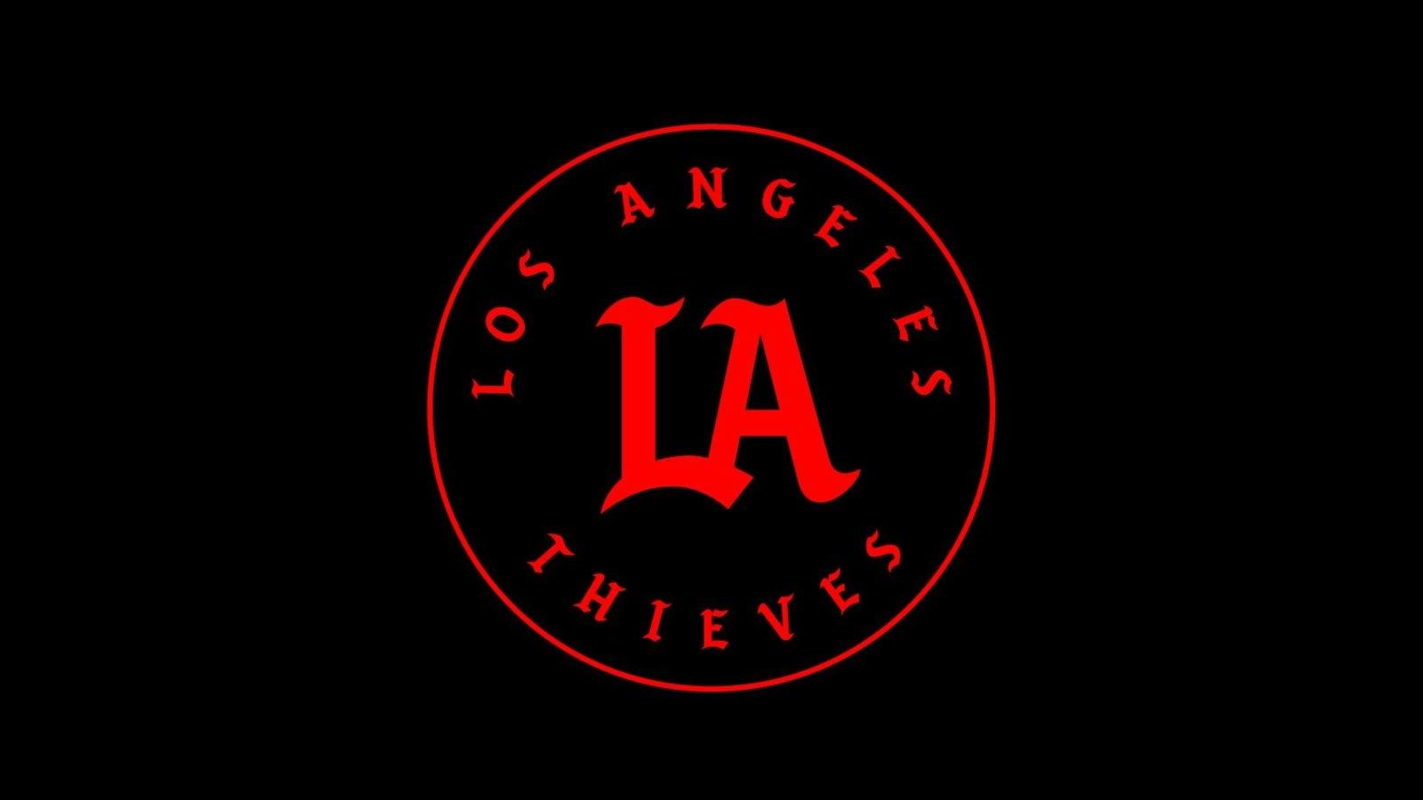 la thieves logo on black background