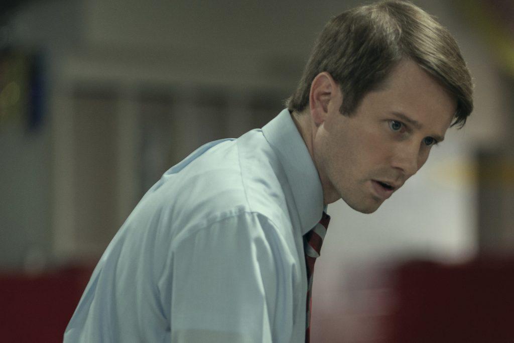 Tyler Ritter as US Attorney John Brownlee in Painkiller