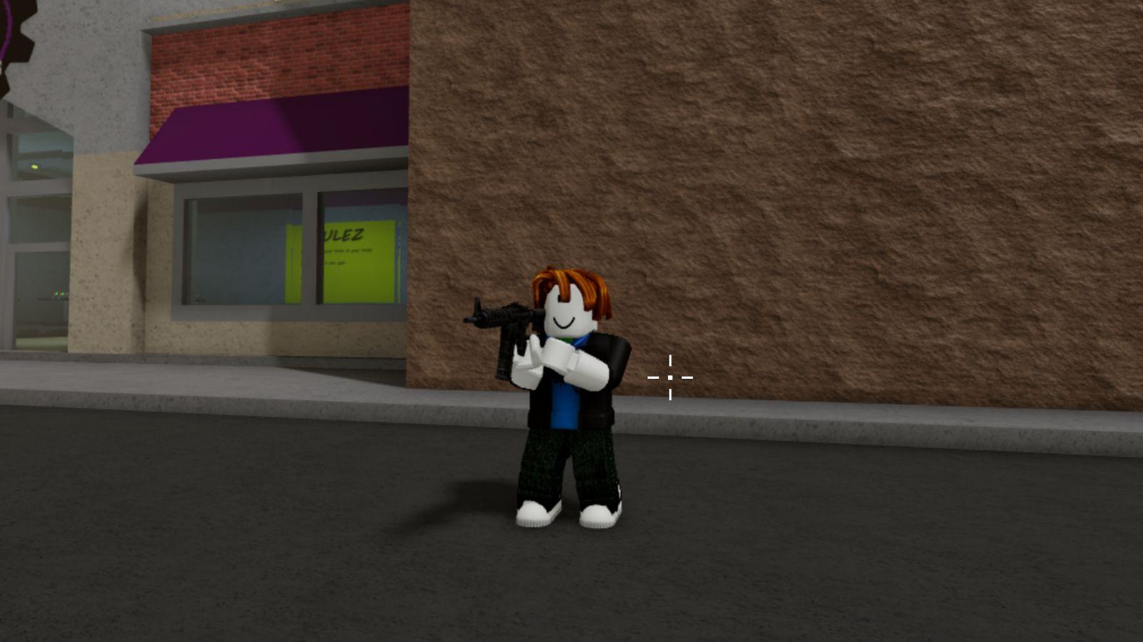 Player standing with gun in Da Hood