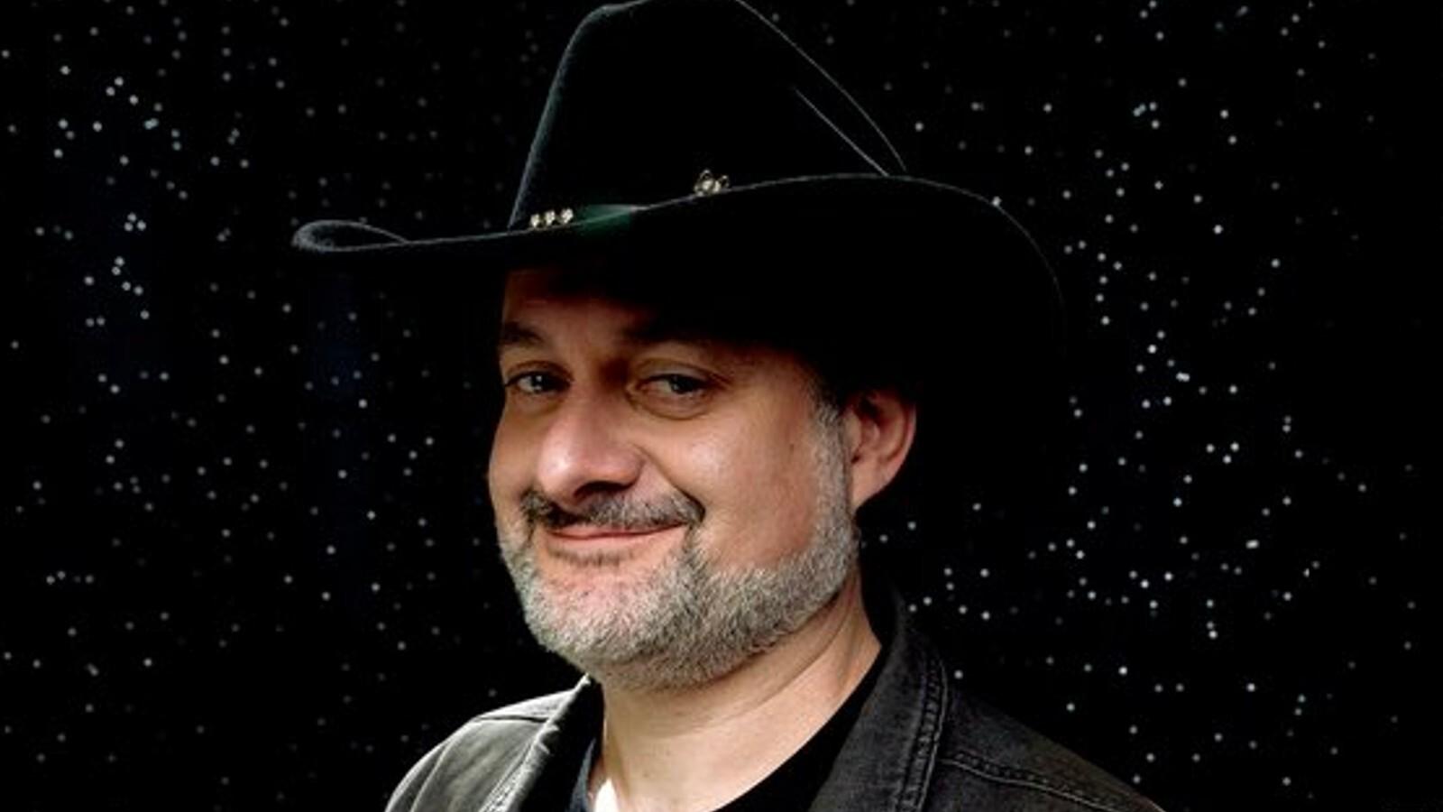 Dave Filoni on a starry background