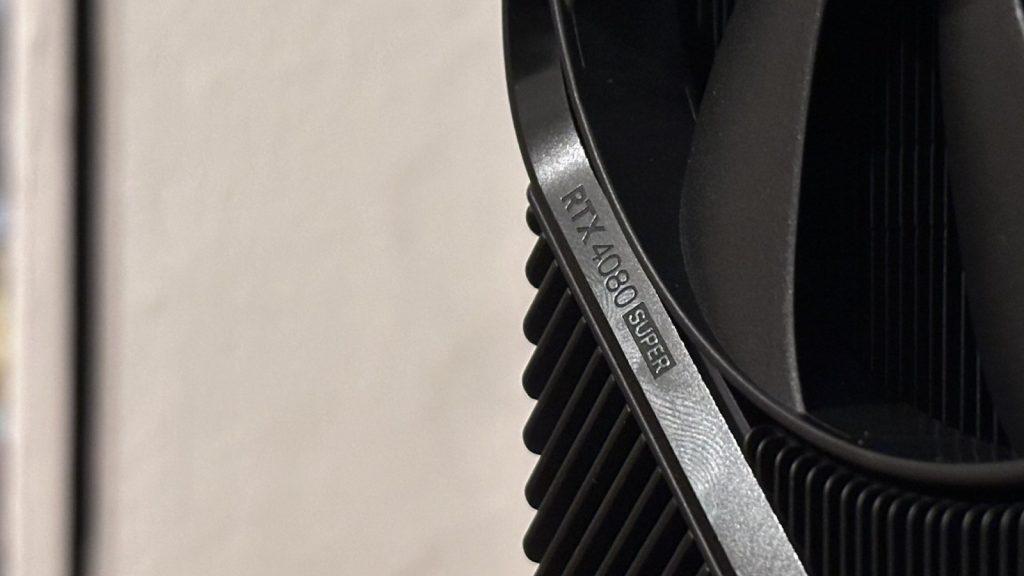 RTX 4080 cooler shot with small silver lettering