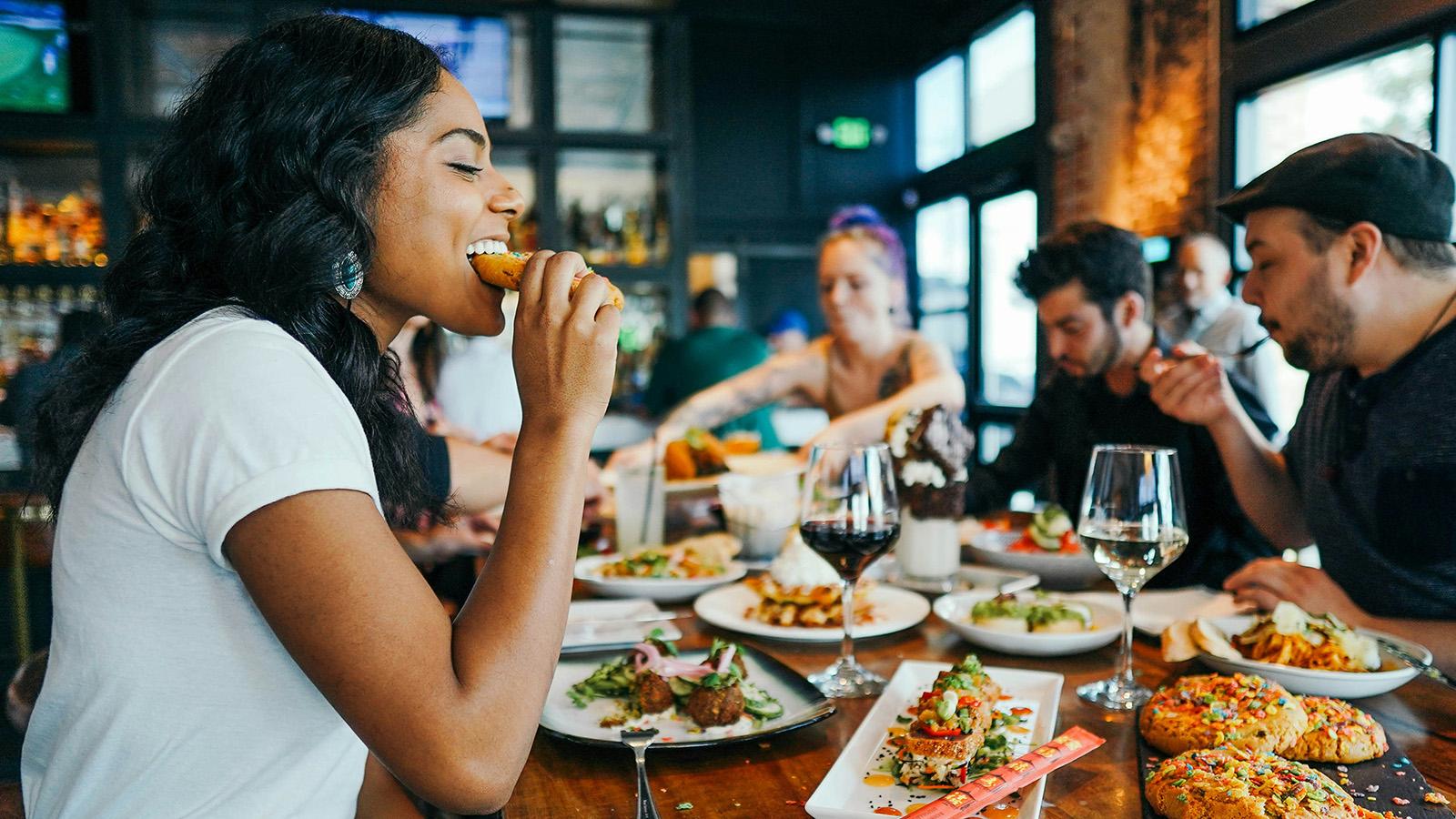 Woman eating at a table