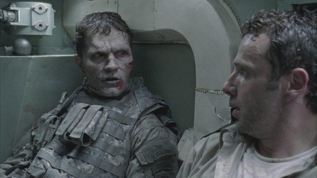 Rick Grimes and the Tank Walker sitting in a tank in The Walking Dead