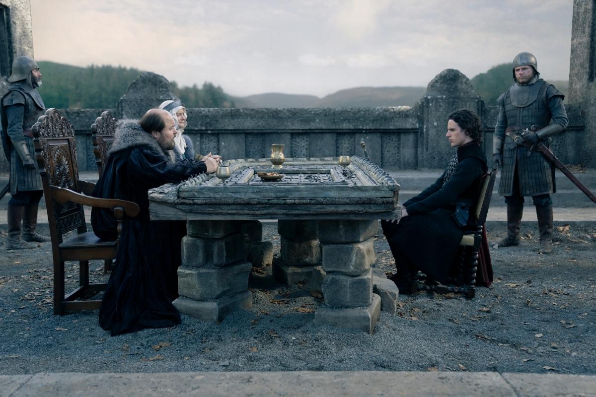 House of the Dragon: Jace sits with the Freys over a table