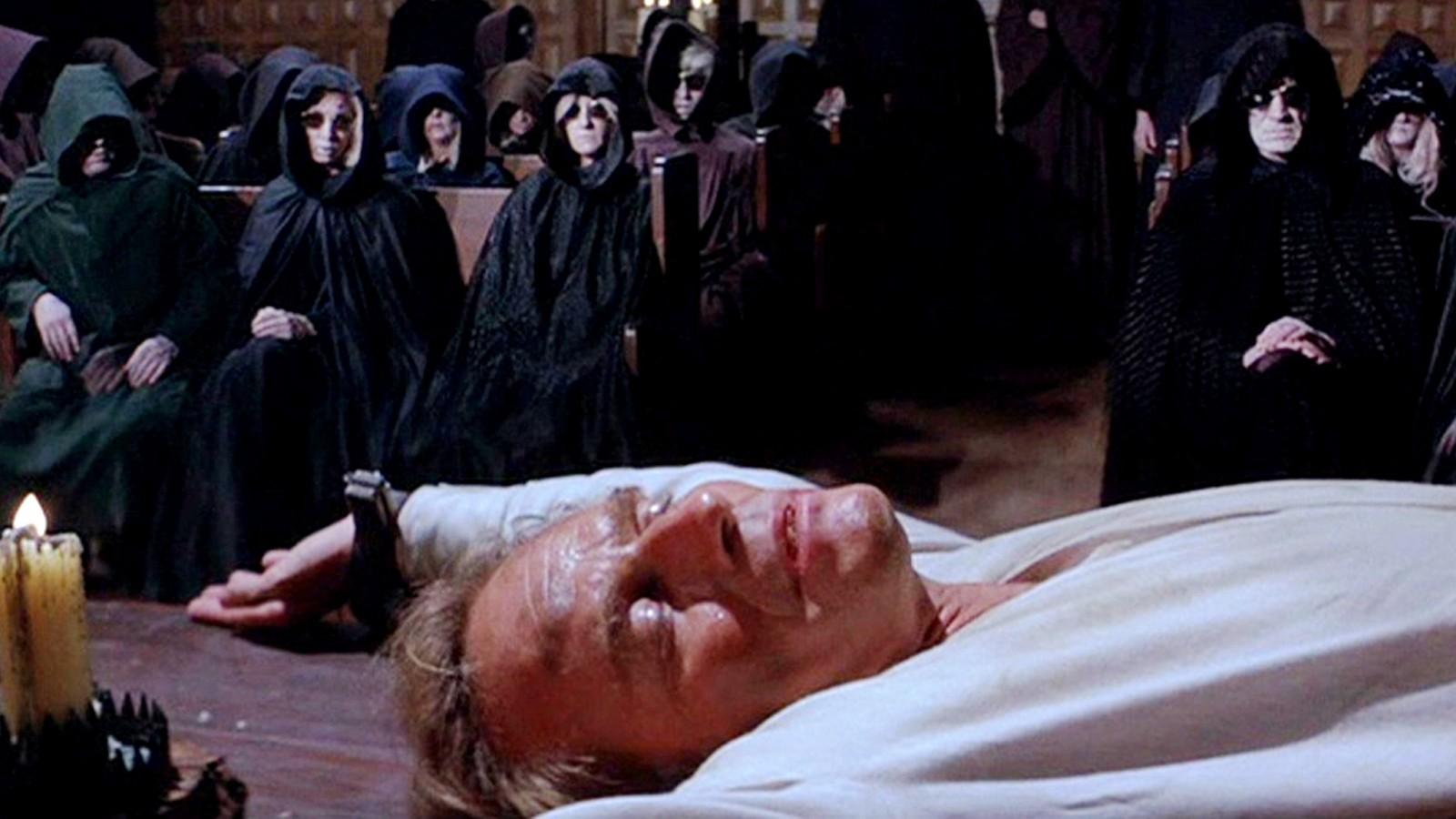 Charlton Heston lying down on a table in The Omega Man.