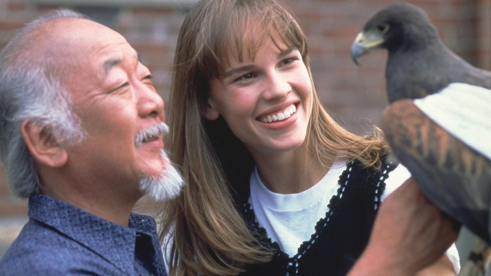 Mr Miyagi and the Next Karate Kid with a pigeon.