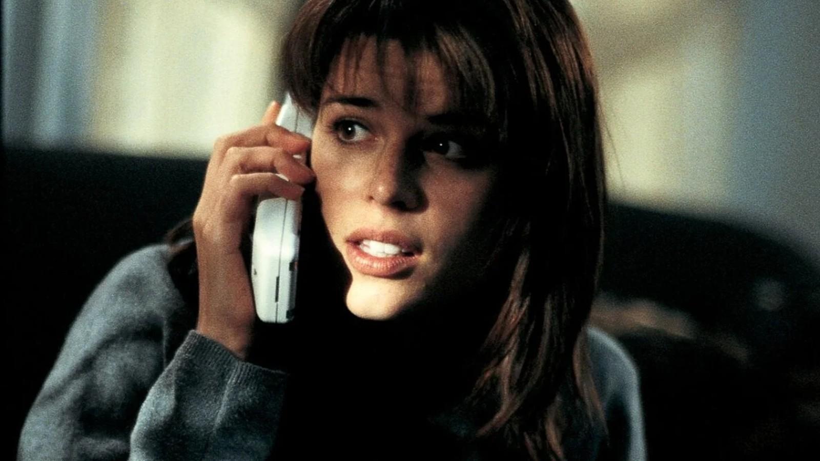 Never Campbell on the phone as Sidney Prescott.