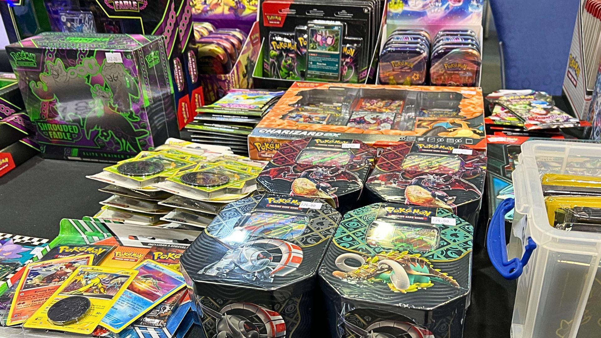 Pokemon cards, boxes, and tins at London Card Show.