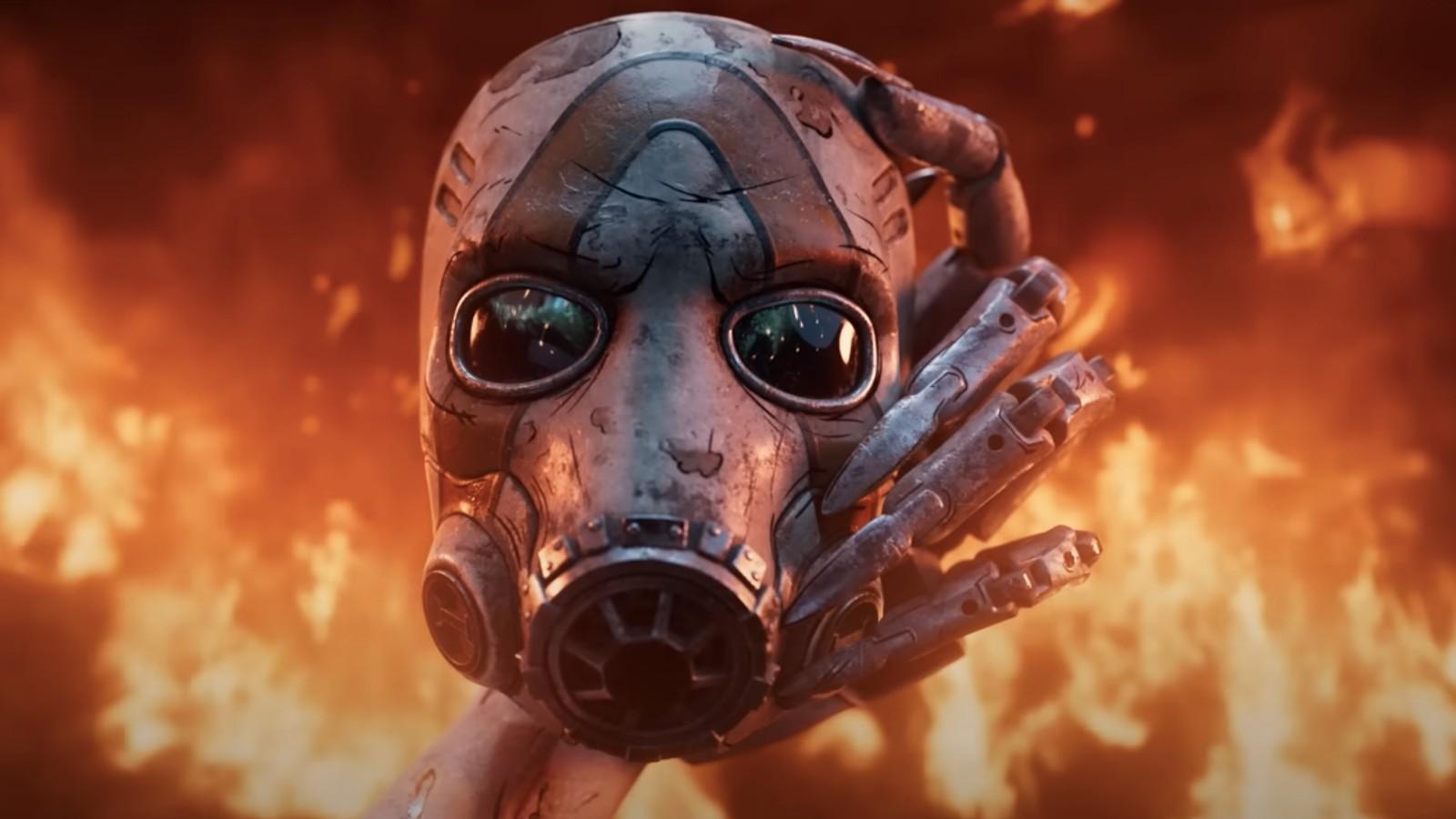 A screenshot of a hand holding a Psycho mask from the Borderlands 4 teaser.