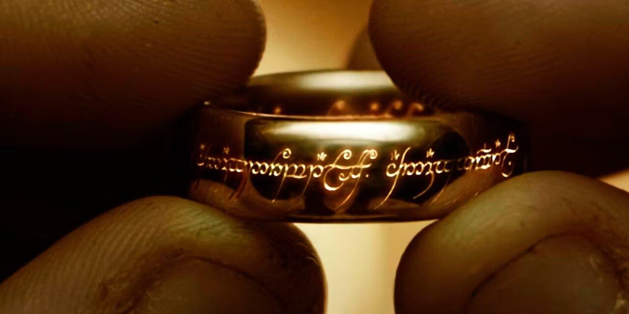 Frodo holding the One Ring in Fellowship of the Ring