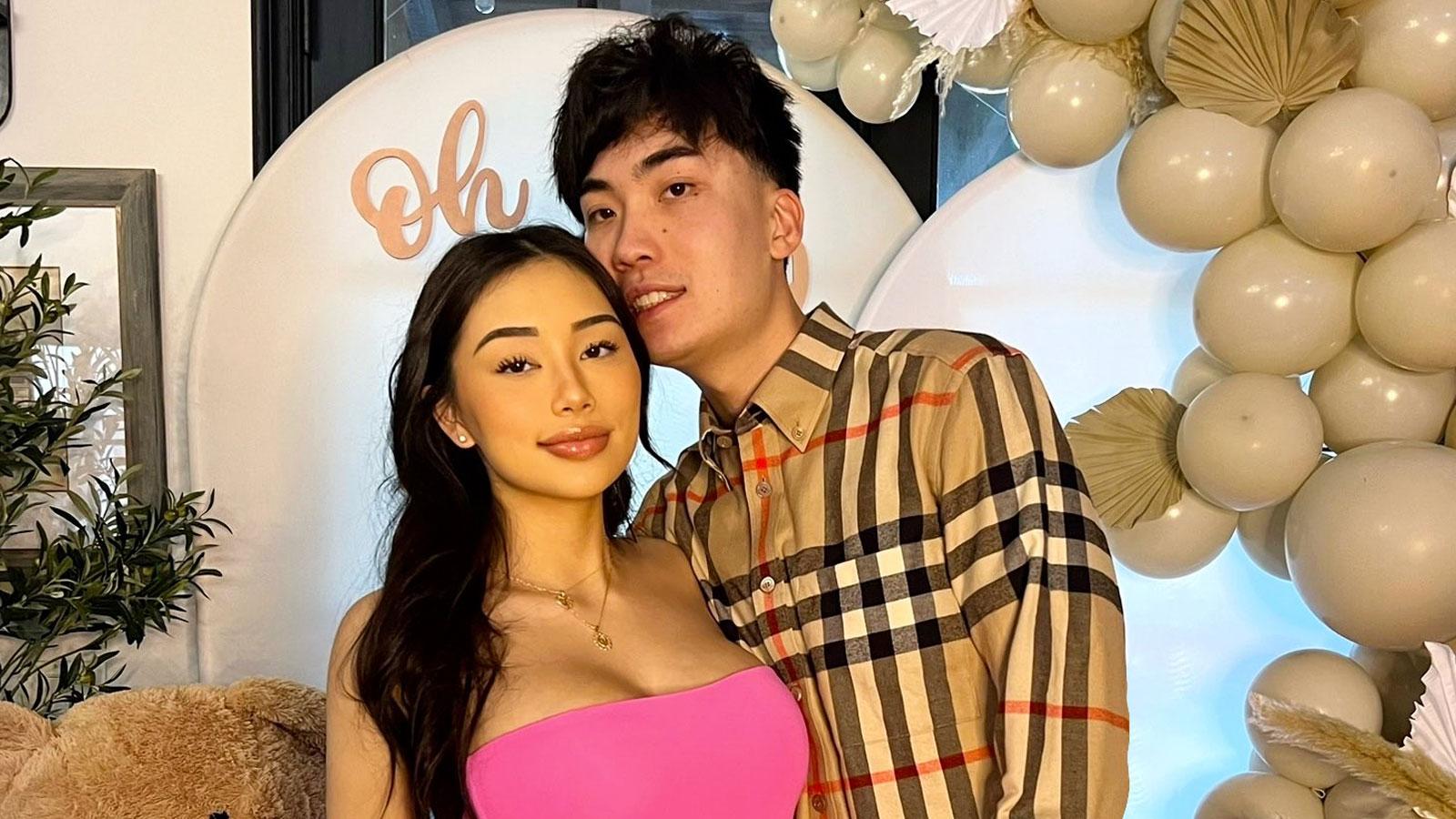 RiceGum poses for a photo with his partner, Ellerie Marie.