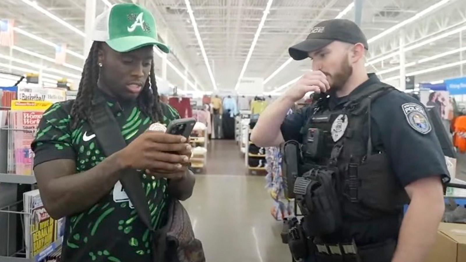 kai cenat speaking to a police officer at walmart