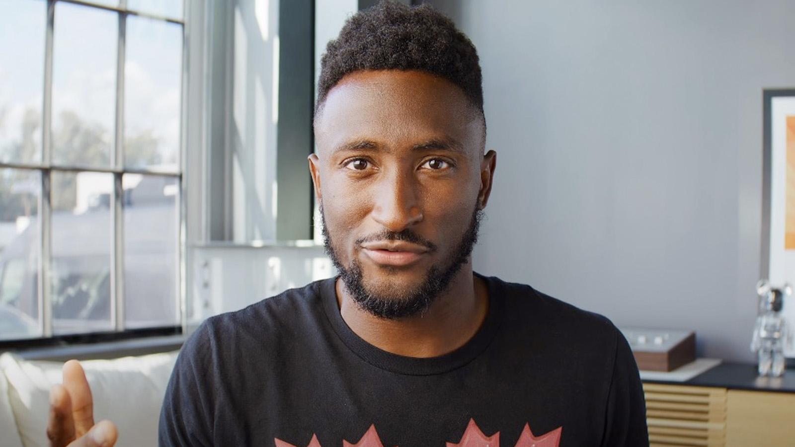 Marques Brownlee looking into the camera wearing a black shirt