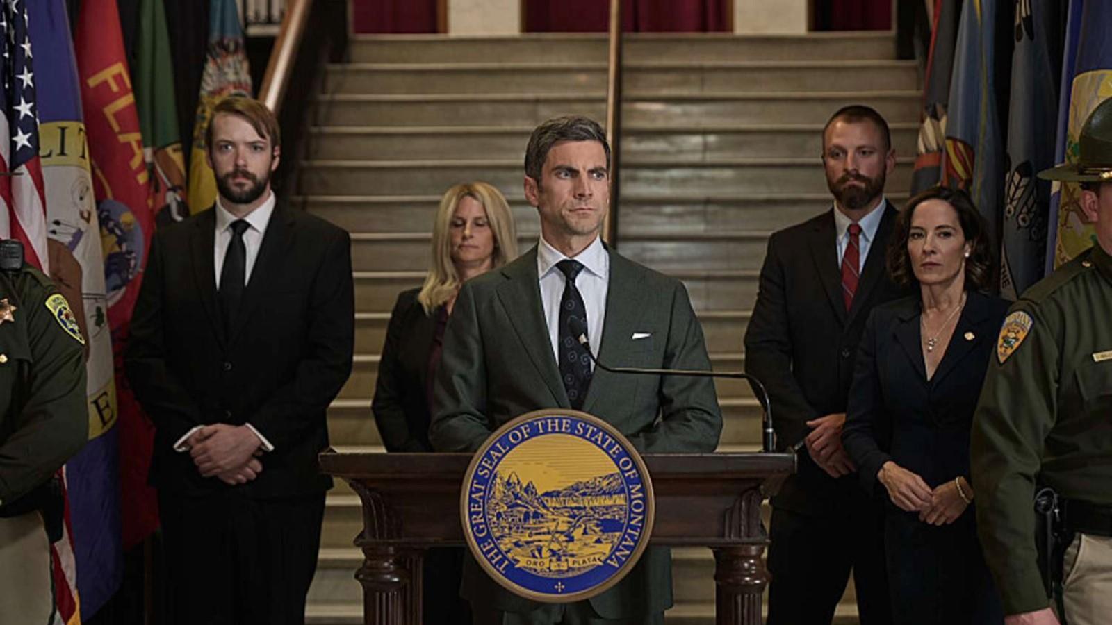 What is a 10-56? Wes Bentley as Jamie Dutton in Yellowstone standing behind a podium