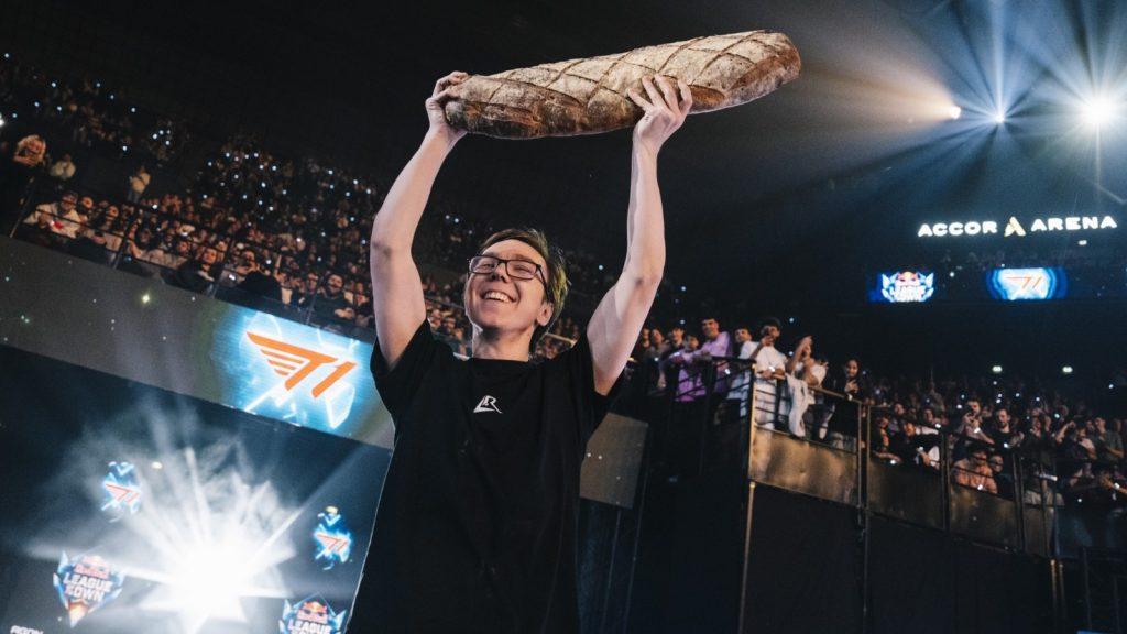 Baus holding up a baguette