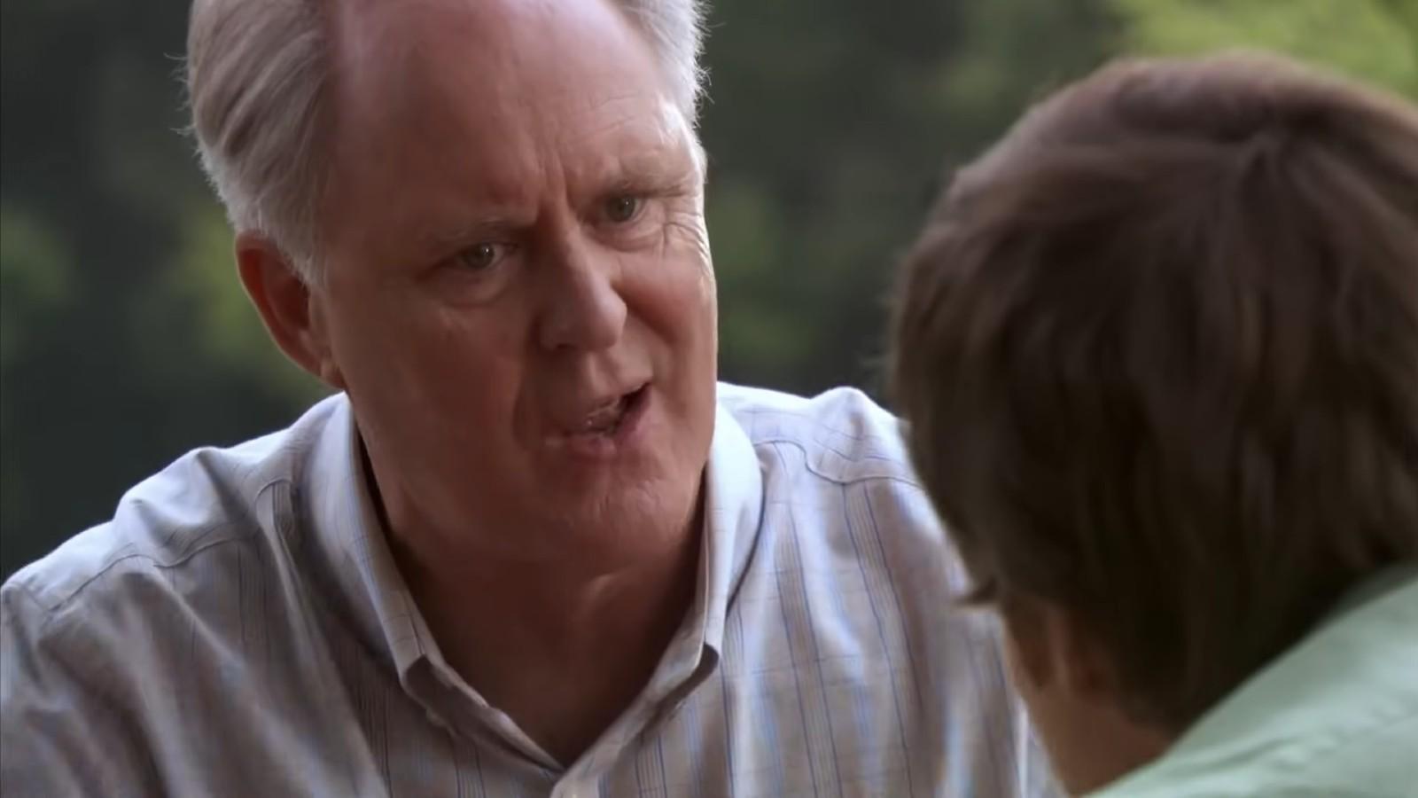 John Lithgow as the Trinity Killer, talking to Michael C. Hall as Dexter