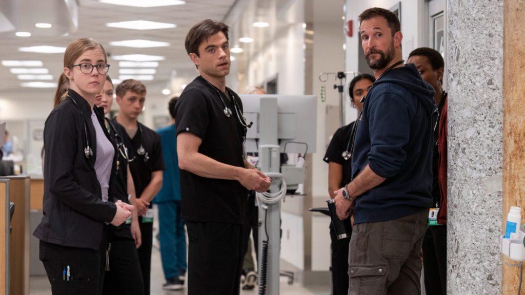 The Pitt team in a hospital corridor.