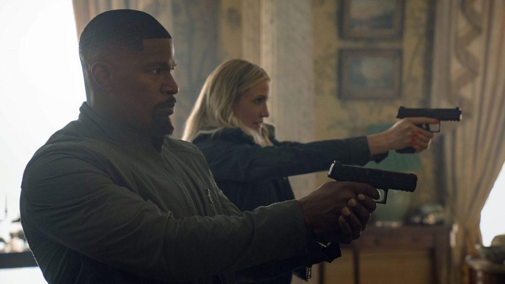 Cameron Diaz and Jamie Foxx shoot guns in Back in Action