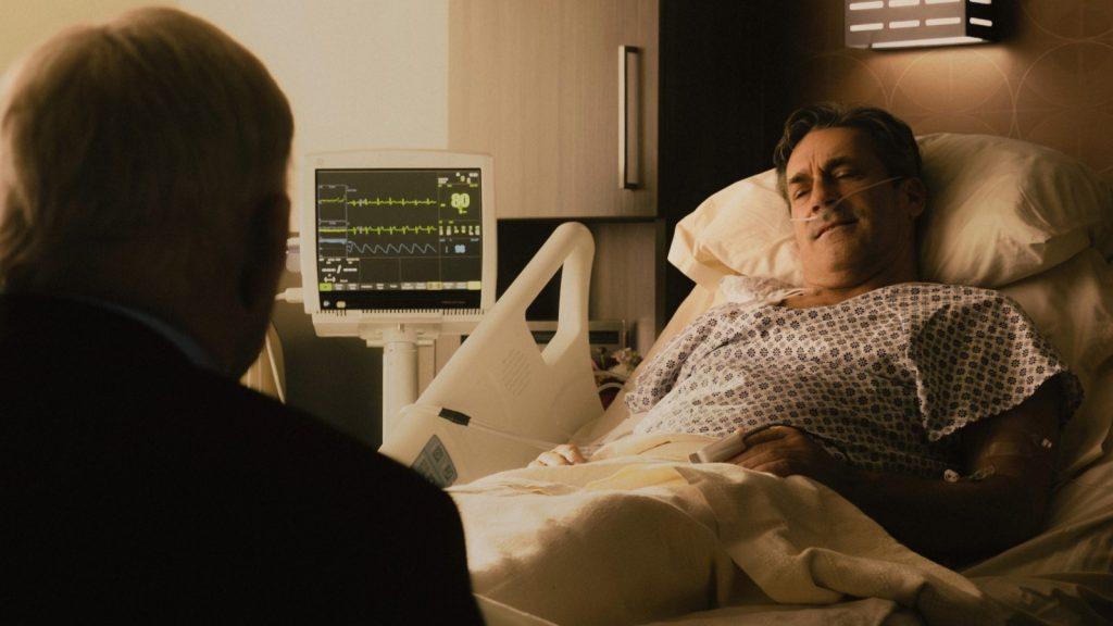 Jon Hamm as Monty in Landman, in a hospital bed