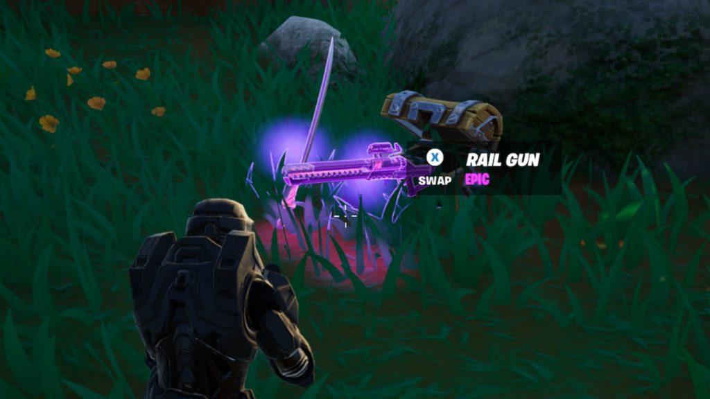 A screenshot featuring a Rail Gun dropped from a chest in Fortnite.