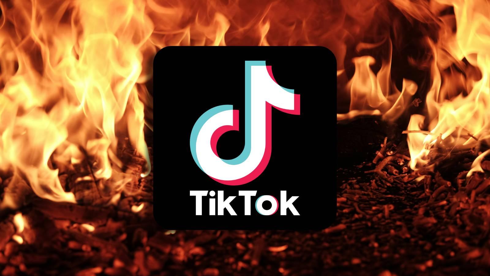 TikTok logo surrounded by fire